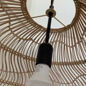 Pendant Light Hanging within a shade.